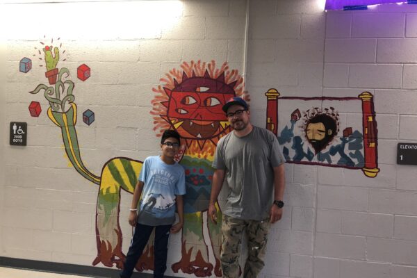 Denver student Miko McMahon-Piel and artist Jaime Molina's mural