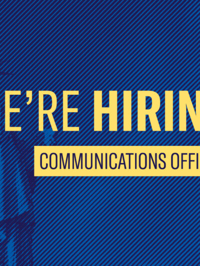 we're hiring communications officer text over image of the statue of liberty