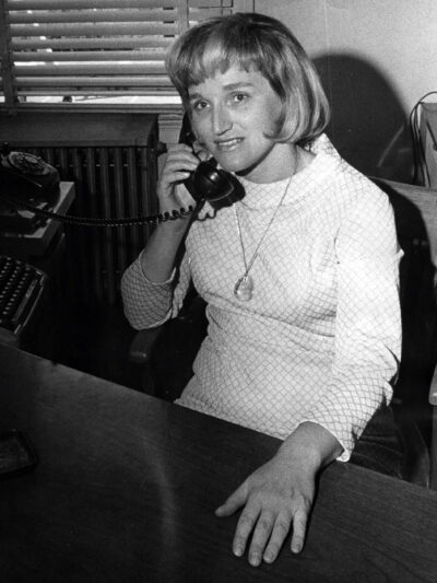 Dorothy Davidson talking on the phone in black and white