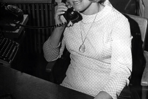 Dorothy Davidson talking on the phone in black and white