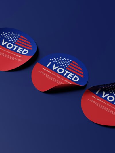 red and blue I voted stickers on blue background