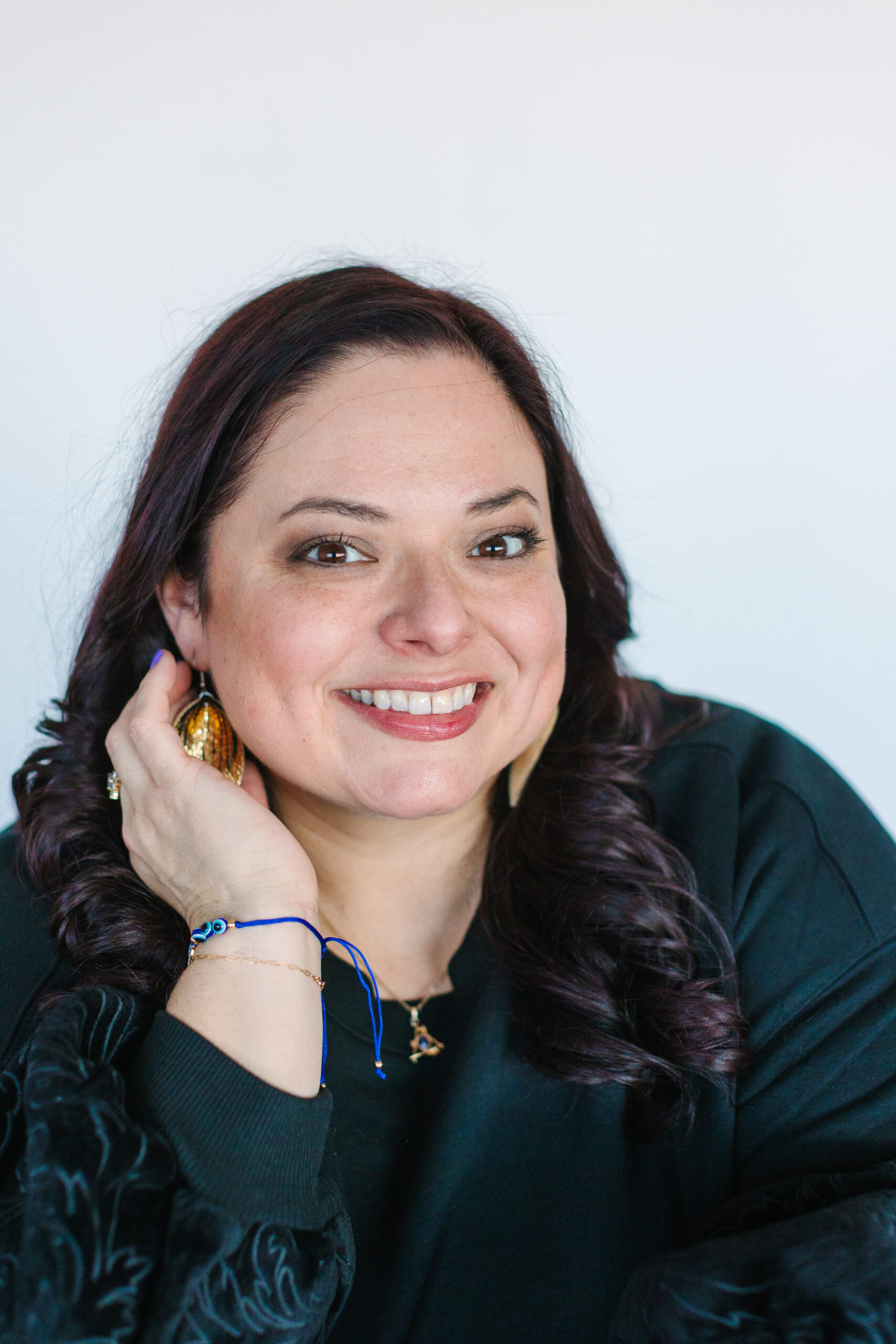 Headshot portrait photo of Suzie Post, smiling