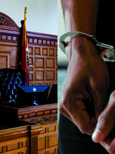 Judge podium next to someone in handcuffs