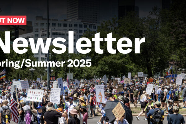 Out now newsletter spring/summer 2025 text over photograph of protesters holding up signs