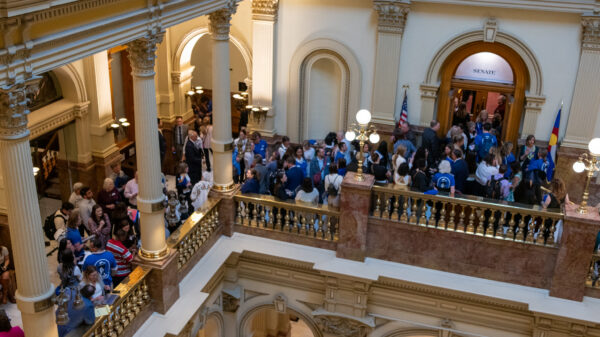 Photo of ACLU of Colorado supporters gathered outside of the senate chambers at the State Capitol