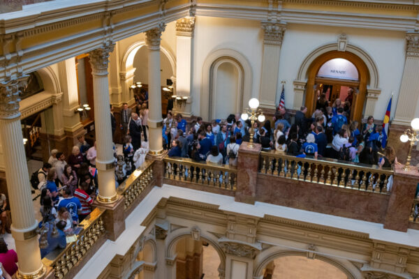 Photo of ACLU of Colorado supporters gathered outside of the senate chambers at the State Capitol