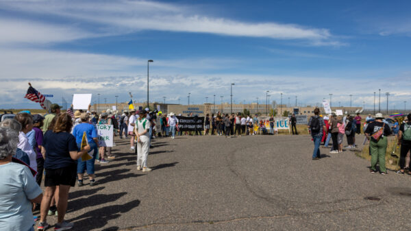 Photo of protesters outside of Hudson Correctional Facility