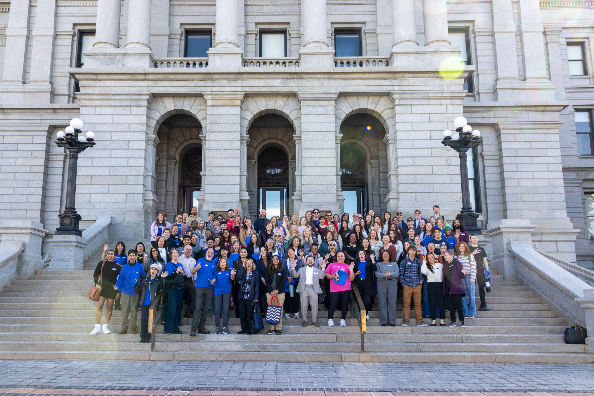 Lobby Day 2026 attendees standing on the steps of the Colorado State Capitol