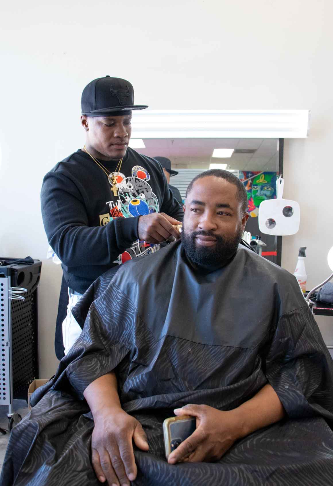 A man gets a haircut at ColoradoSpringsWorks as part of ACLU of Colorado's voter engagement event on October 29, 2022.