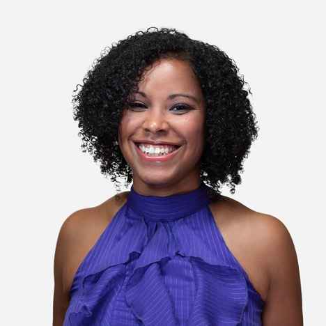 Portrait headshot of Erica Tinsley, Communications Officer, in front of a white background