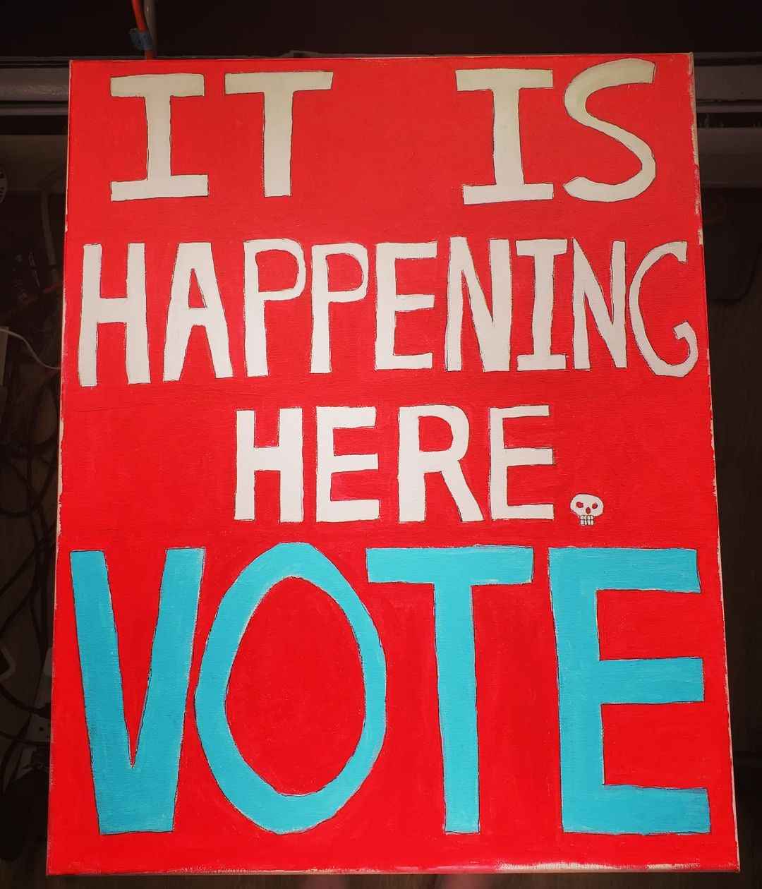 It is happening here. vote text on red poster