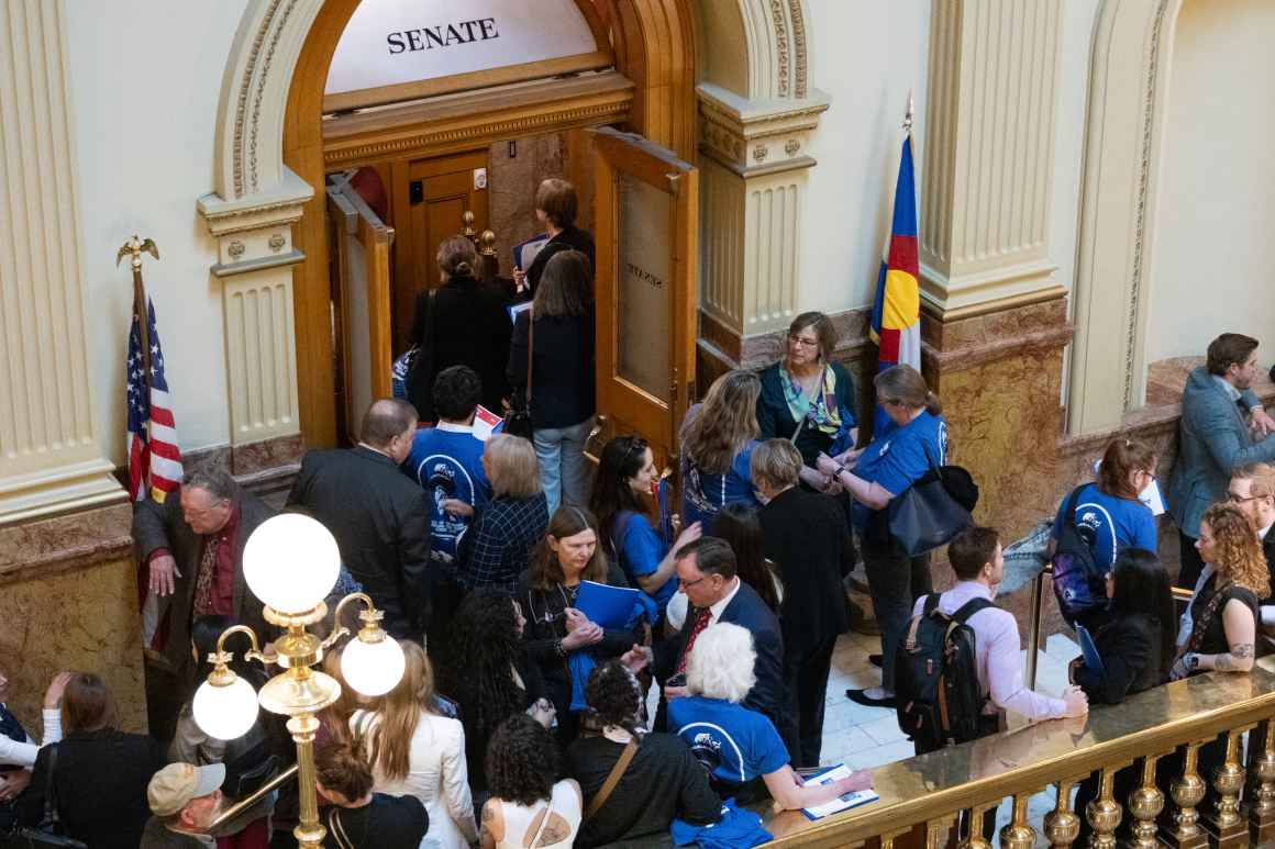 ACLU of Colorado activists speak with elected officials and other legislative staff on February 25, 2025.