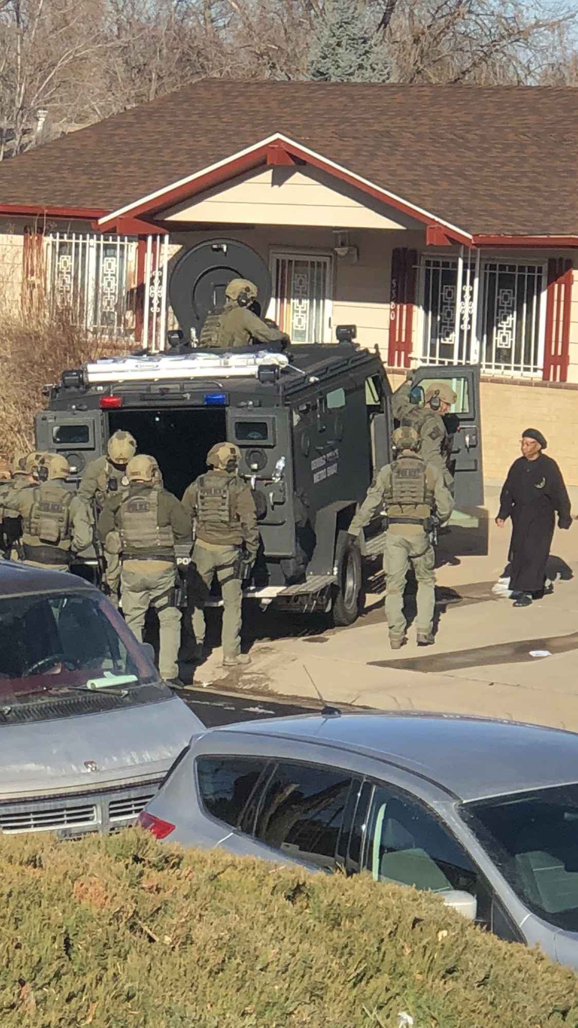 police SWAT vehicle outside home of Ruby Johnson