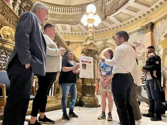 Julian Camera, ACLU of Colorado Field Organizer leading a tour group at the State Capitol during lobby week