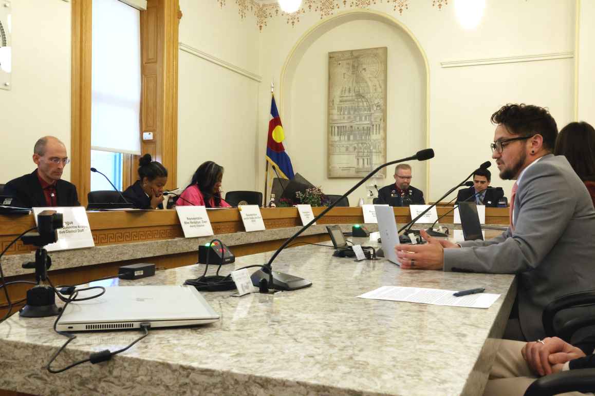 Photo of ACLU of Colorado senior policy strategist Anaya Robinson testifying in front a legislative committee
