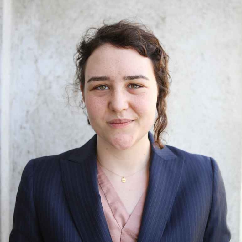 A portrait headshot of EMMA MCLEAN-RIGGS