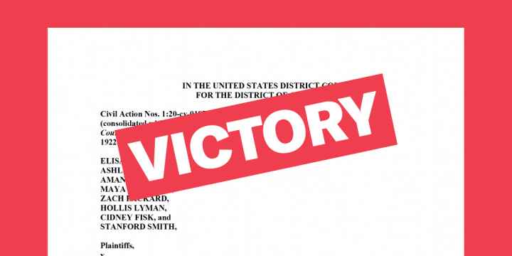 Victory text over original legal complaint in background