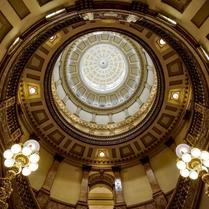 Photo of Colorado State Capitol's rotunda interior looking up at the dome