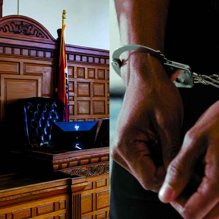 Judge podium next to someone in handcuffs
