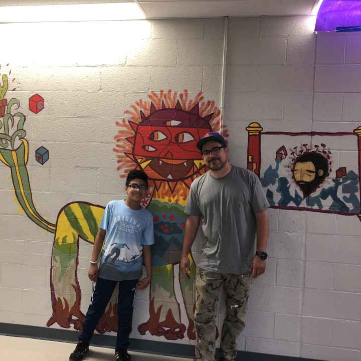 Denver student Miko McMahon-Piel and artist Jaime Molina's mural
