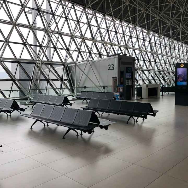 Photo of empty waiting area near an airport terminal