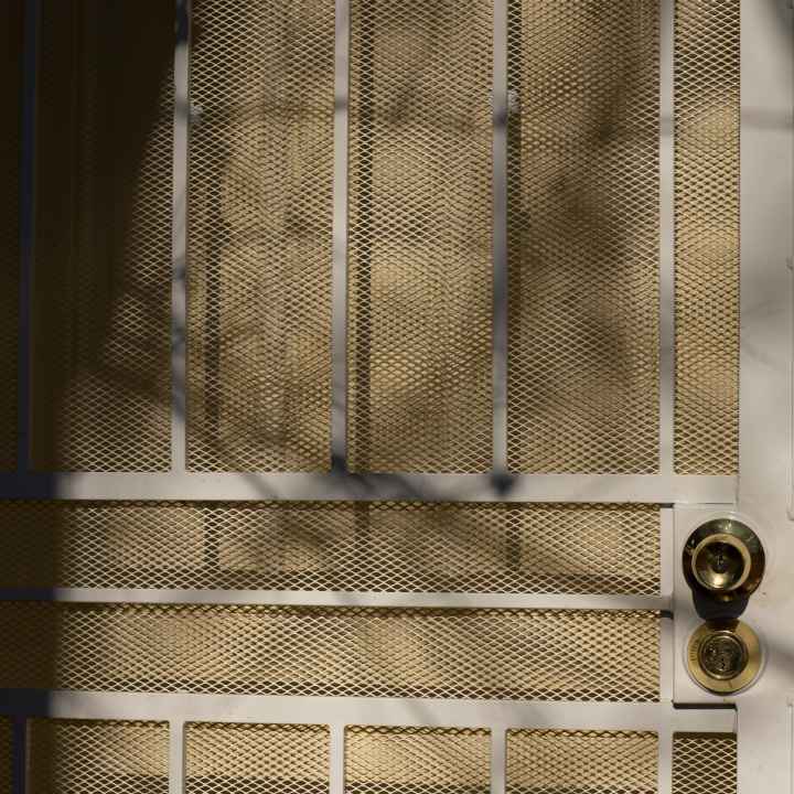 brown door with white screen