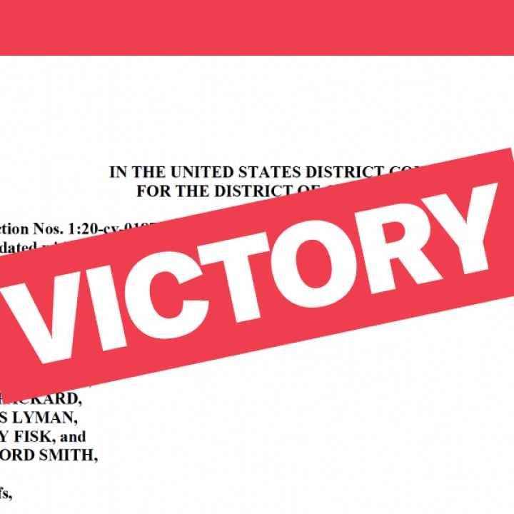 Victory text over original legal complaint in background